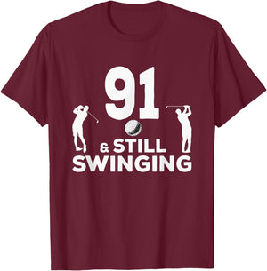 Funny 91 And Still Swinging 91st Birthday 91 Year Old Golfer T-Shirt - T-Shirt | Maroon