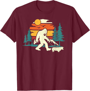 Retro Bigfoot Walking Welsh Corgi Dog Walker Sasquatch T-Shirt - T-Shirt | Maroon