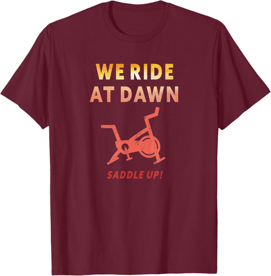 We Ride at Dawn Funny Indoor Spin Cycle Workout Class Saying T-Shirt - T-Shirt | Maroon