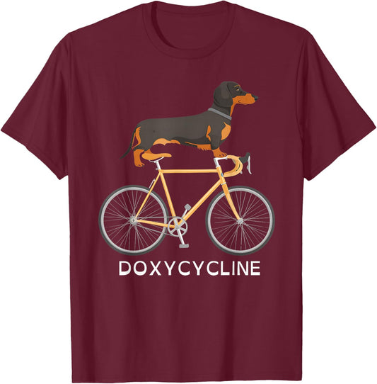 Dachshund on Bicycle Doxycycline Pharmacy Pun Dog Pharmacist Women T-Shirt - T-Shirt | Maroon