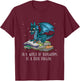 in A World Full of Bookworms Be A Book Dragon T-Shirt - T-Shirt | Maroon