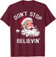 Don't Stop Believing Christmas Vintage Santa Funny Xmas T-Shirt - T-Shirt | Maroon