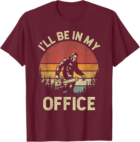 I'll Be In My Office Logging Retro Bigfoot Carrying Chainsaw T-Shirt - T-Shirt | Maroon