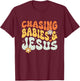 Chasing Babies And Jesus Religious Christian T-Shirt - T-Shirt | Maroon
