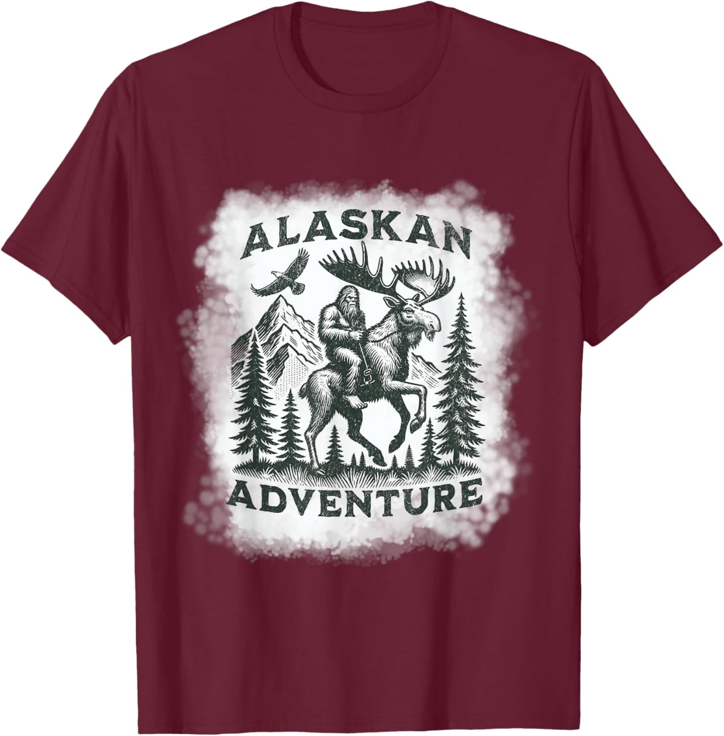 Alaskan Adventure Bigfoot Riding Moose Funny Outdoor Alaska T-Shirt - T-Shirt | Maroon