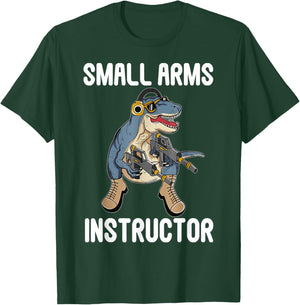 Small Arms Instructor Funny T-rex Dinosaur Gun T-Shirt - T-Shirt | Forest