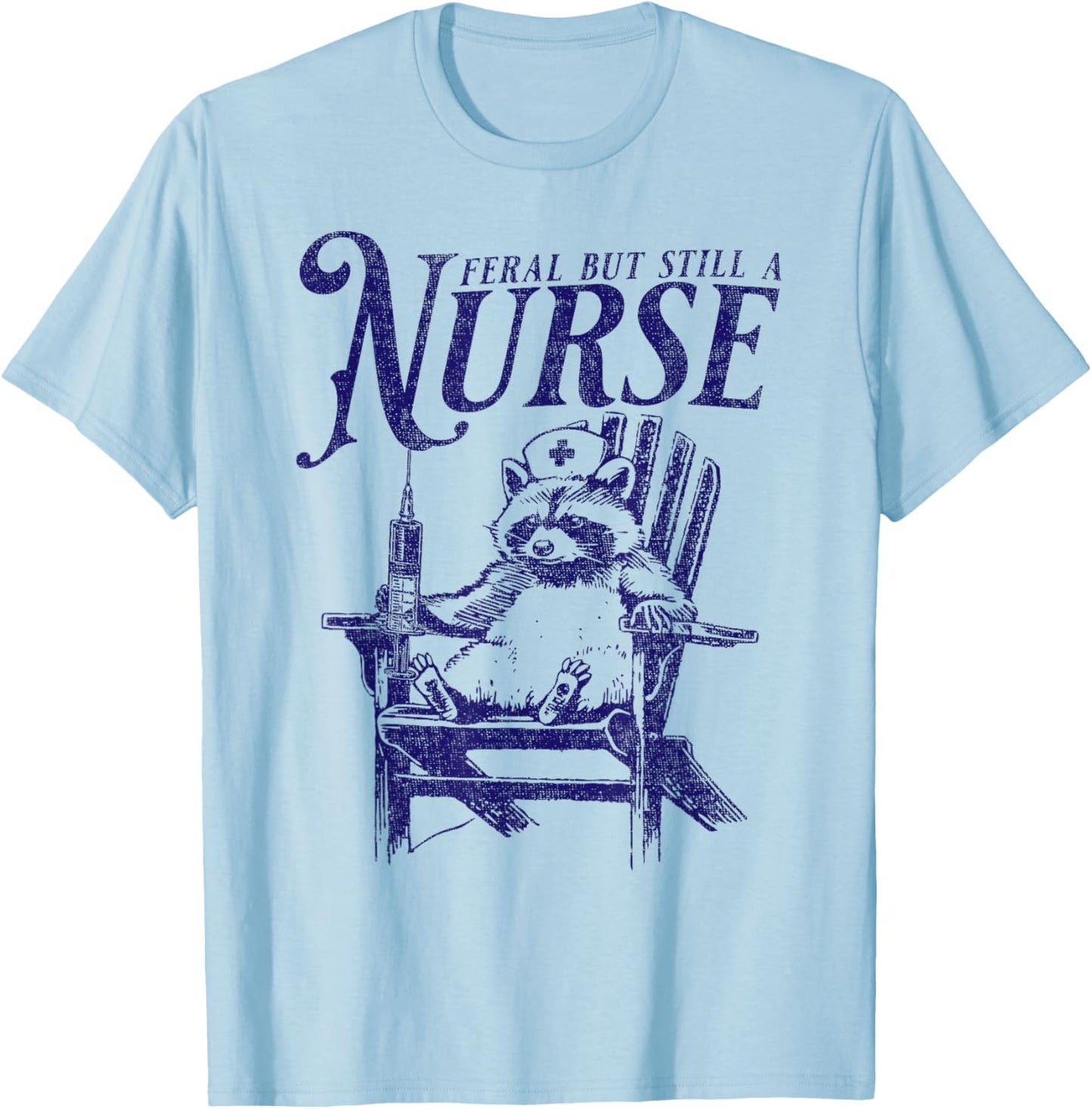 Feral But Still A Nurse Funny Feral Nurse Raccoon Nurse T-Shirt - T-Shirt | Light Blue