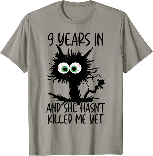 9 Years In And She Hasn't Killed Me Yet T-Shirt - T-Shirt | Sand