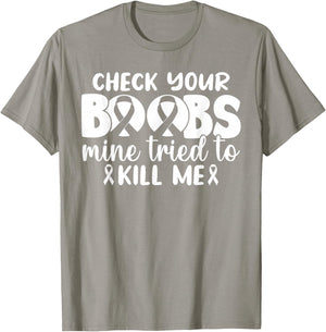 Check Your Boobs Mine Tried To Kill Me T-Shirt - T-Shirt | Sand