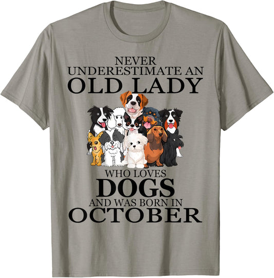 Never underestimate an old lady who loves dogs OCTOBER T-Shirt - T-Shirt | Sand