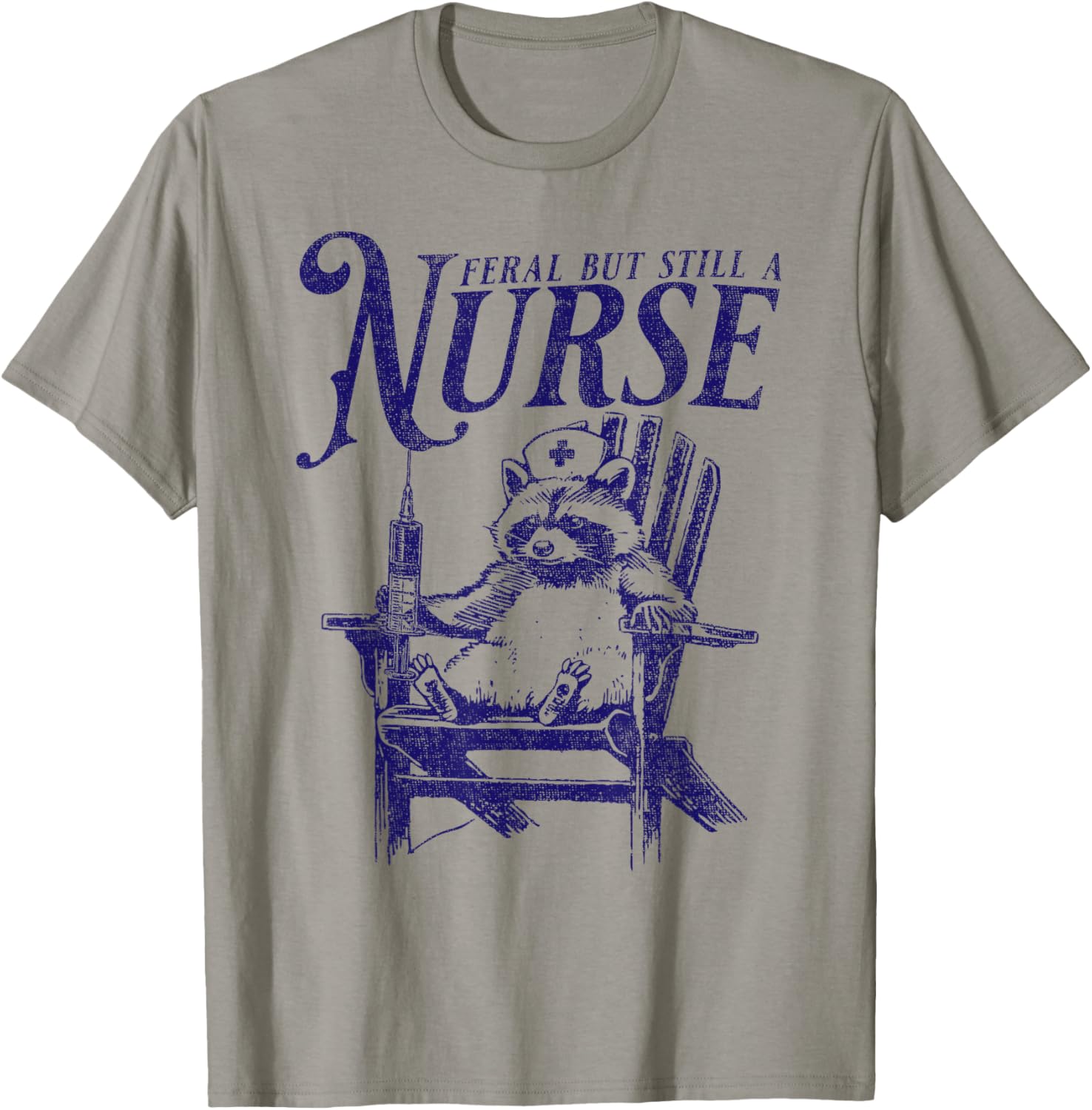 Feral But Still A Nurse Funny Feral Nurse Raccoon Nurse T-Shirt - T-Shirt | Sand