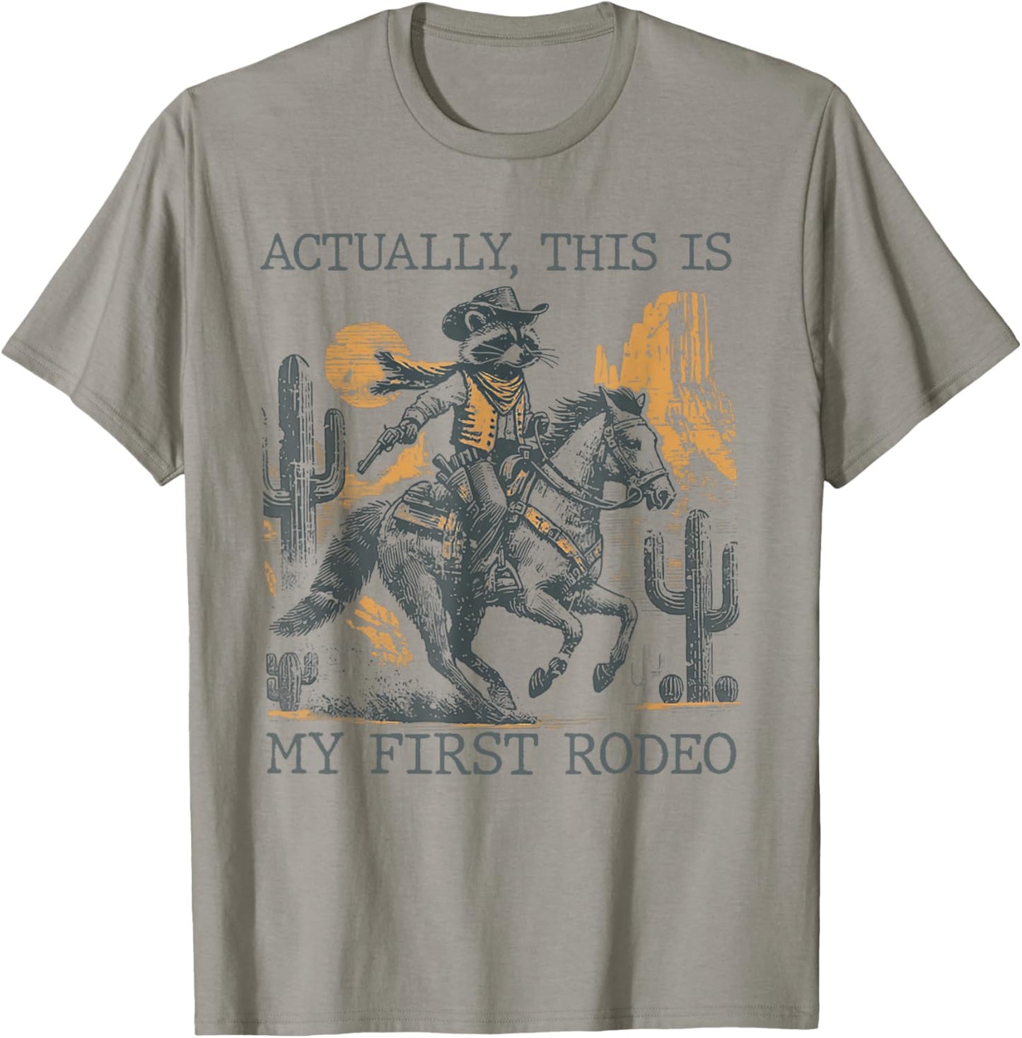 Western Cowboy Raccoon Actually This Is My First Rodeo T-Shirt - T-Shirt | Sand